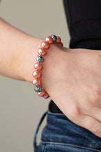 Load image into Gallery viewer, Paparazzi&#39;s Rosy Radiance - Orange Pearl bracelet
